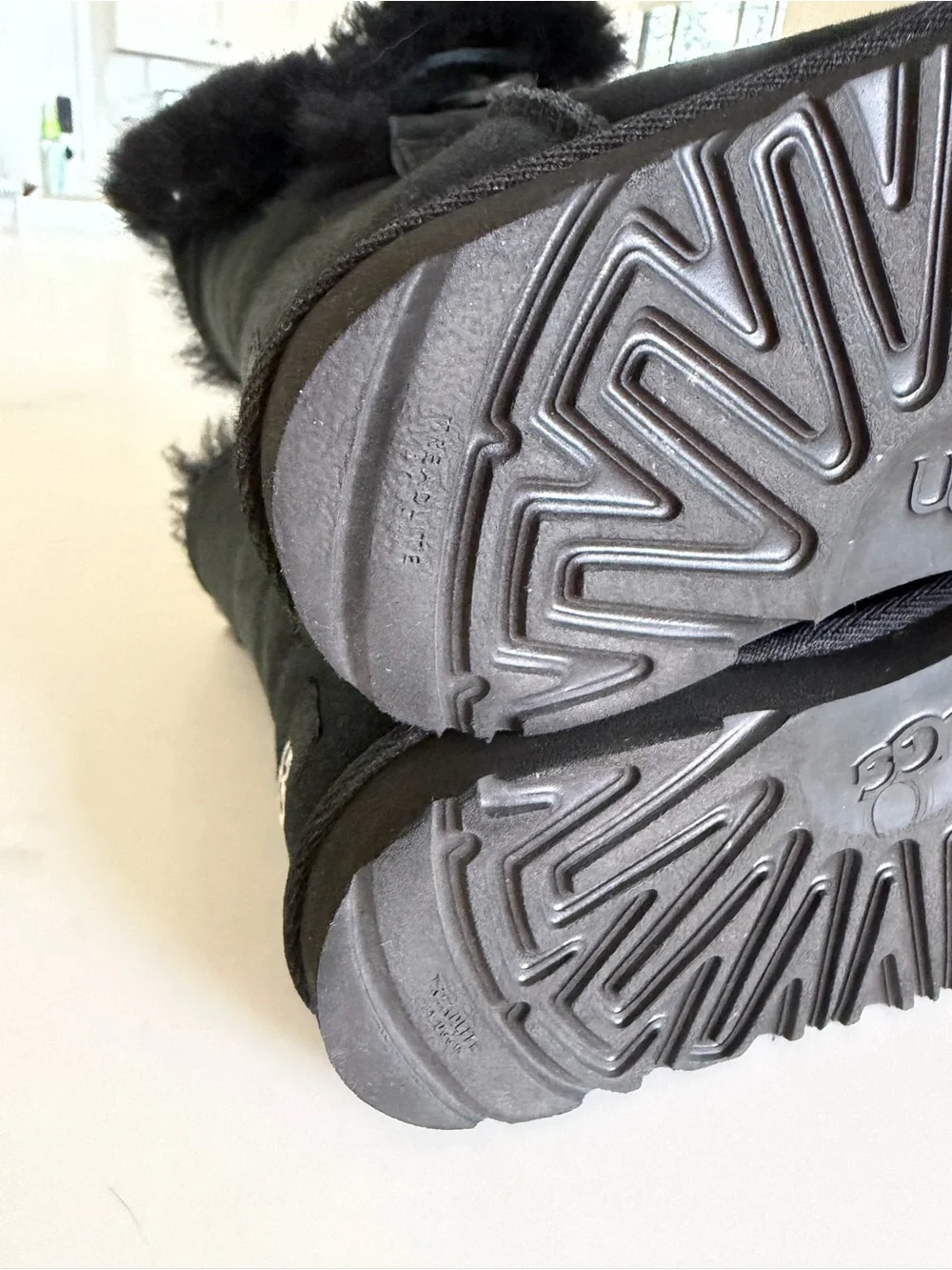 UGG Kids Mini Bow Back Boots in Black Size 12 (only worn twice)